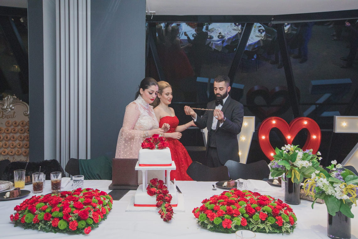 Middle Eastern couple's engagement day at Saint Dunstan in the East Church Garden