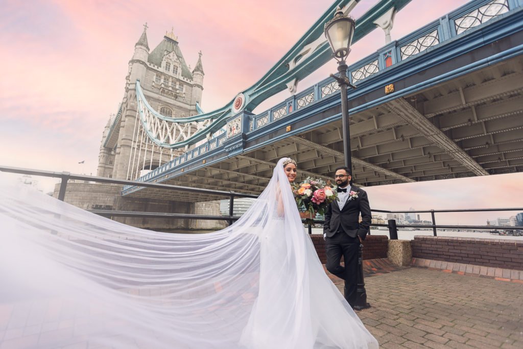 Indian Bride and Groom Wedding Day at Tower Bridge, central London, UK
